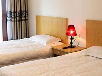 Wangsu Business Hotel Binjiang Bagian luar foto